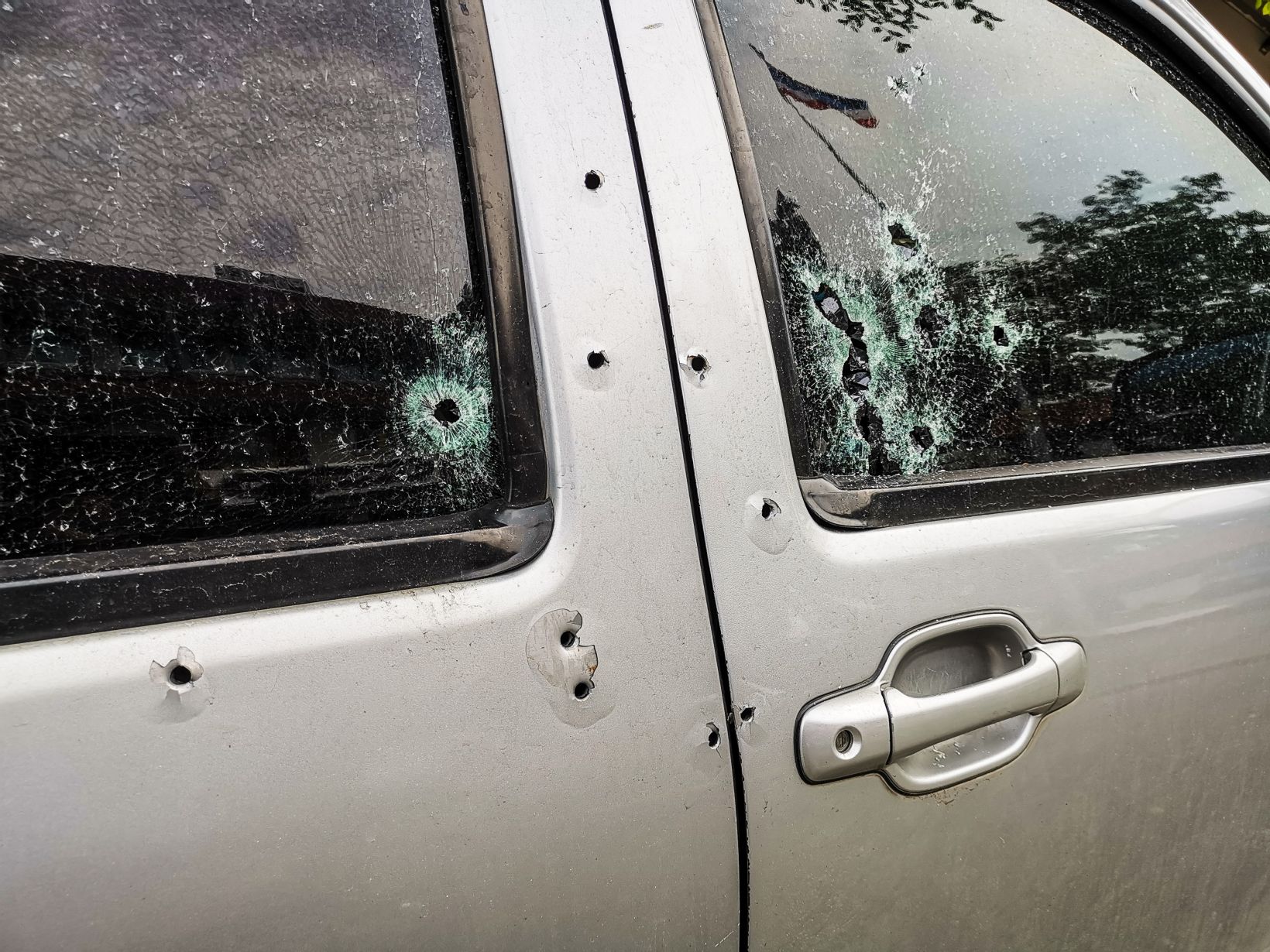 bullet holes in car