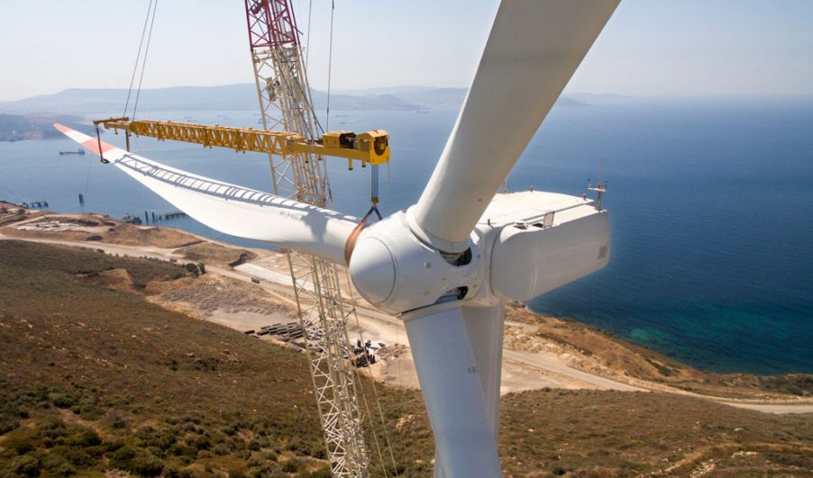 Crane installing a wind turbine blade