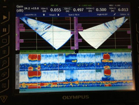 This screen capture show the OmniScan MX2 scan display with indications from EDM reference notches positioned in the ERW seam on both the OD and ID.